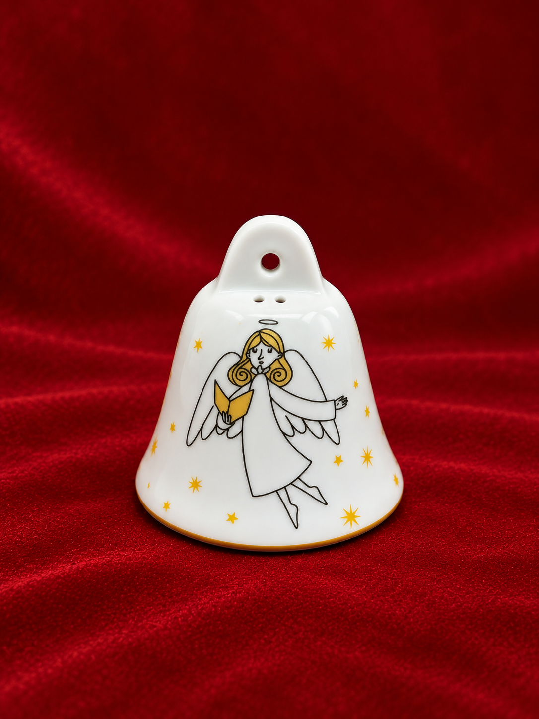 Sino de Natal em porcelana em composição clara